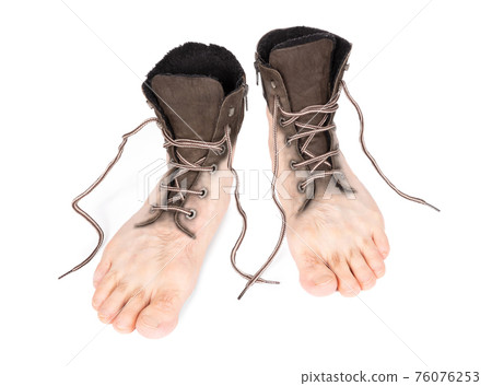 Walking shoes merged with adult male feet - Concept of walking Walking shoes merged with adult male feet - Concept of walking 76076253