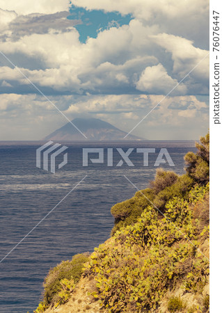 Rock cliff of cape Capo Vaticano with Aeolian Islands, Tyrrhenian Sea, Calabria, Southern Italy Rock cliff of cape Capo Vaticano with Aeolian Islands, Tyrrhenian Sea, Calabria, Southern Italy 76076447