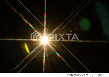 Abstract sun flare. The lens flare is subject to digital correction Abstract sun flare. The lens flare is subject to digital correction 76076592