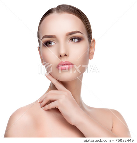 Beauty Portrait of Young Woman with Perfect Clean Fresh Skin close up isolated on white background - Skin Care Concept.. Beauty Portrait of Young Woman with Perfect Clean Fresh Skin close up isolated on white background - Skin Care Concept.. 76082449
