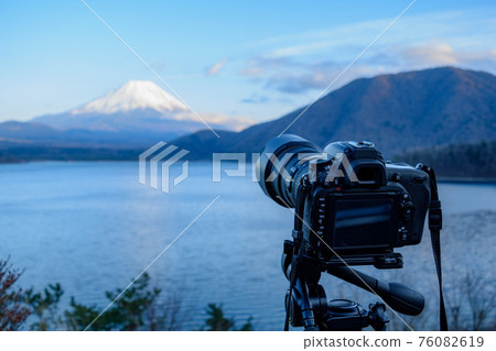 Mt. Fuji and single-lens reflex camera before dusk 76082619