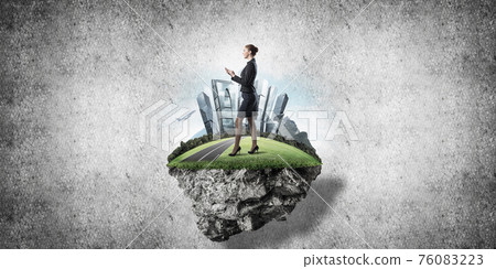 Confident lady boss and modern city as concept of eco green cons Confident lady boss and modern city as concept of eco green cons 76083223