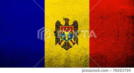 The Republic of Moldova National flag. Grunge background 76083794