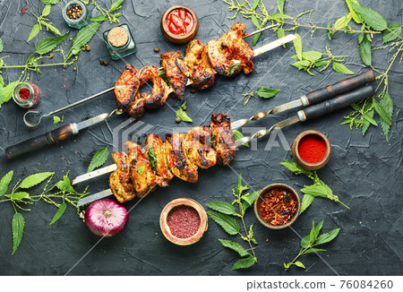 Kebab marinated in nettles Kebab marinated in nettles 76084260