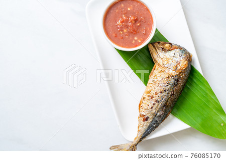 Fried mackerel fish with spicy shrimp paste sauce 76085170
