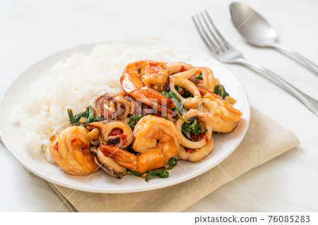 rice and stir-fried seafood with Thai basil rice and stir-fried seafood with Thai basil 76085283