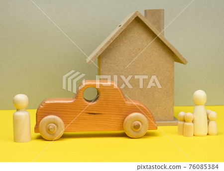 wooden house and car with miniature family figures, mortgage and loan concept wooden house and car with miniature family figures, mortgage and loan concept 76085384