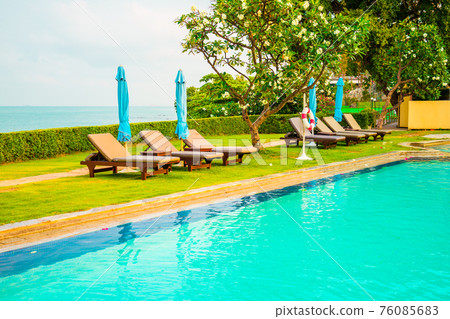 chair pool and umbrella around swimming pool chair pool and umbrella around swimming pool 76085683
