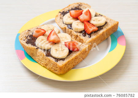 whole wheat bread with fresh banana, strawberry and chocolate whole wheat bread with fresh banana, strawberry and chocolate 76085782