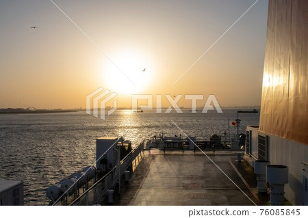 Asahi from the ship where a ship floats in the sea and birds fly in the sky 76085845