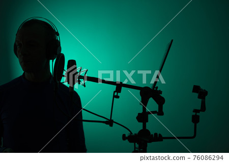 Voiceover actor studio microphone 76086294