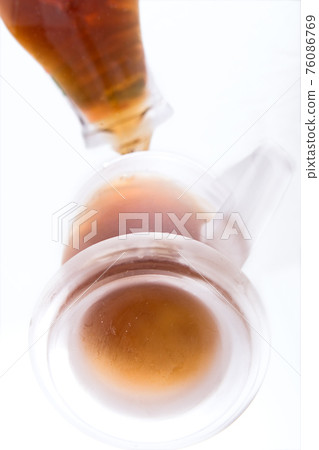 bottom cup with tea on white background bottom cup with tea on white background 76086769