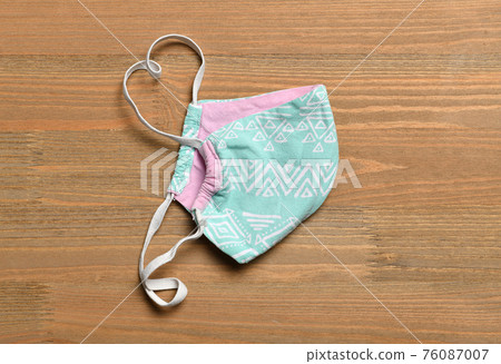 handmade protective face mask for respiratory protection against viruses, germs, covid or coronavirus, and other infections 76087007