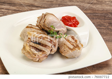 Grilled pork tenderlion with tomato sauce Grilled pork tenderlion with tomato sauce 76087722
