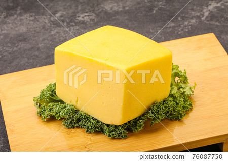Yellow tilsiter cheese dairy product Yellow tilsiter cheese dairy product 76087750