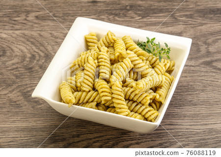 Italian pasta Fusilli with pesto 76088119