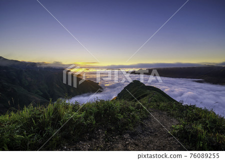 Ta Xua is a famous mountain range in northern Vietnam. All year round, the mountain rises above the clouds creating cloud inversions. Ta Xua is a famous mountain range in northern Vietnam. All year round, the mountain rises above the clouds creating cloud inversions. 76089255