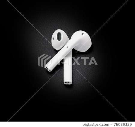 White headphones wireless earphones White headphones wireless earphones 76089329