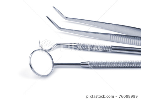 Dental tools on a white Dental tools on a white 76089989