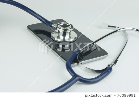 Stethoscope on the smartphone. Stethoscope on the smartphone. 76089991