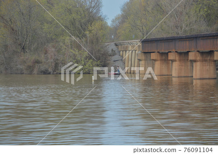 A Railroad bridge over Lake Dardanelle reservoir on the Arkansas River in Clarksville, Arkansas A Railroad bridge over Lake Dardanelle reservoir on the Arkansas River in Clarksville, Arkansas 76091104