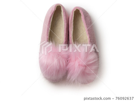 Felt slippers on white background in closeup 76092637