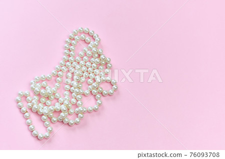 Feminine desktop mockup with pearls on pink background with copy space. Feminine desktop mockup with pearls on pink background with copy space. 76093708