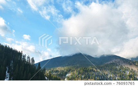 Sunrise in a Valley at Foggy Morning Mountains Landscape 76093765