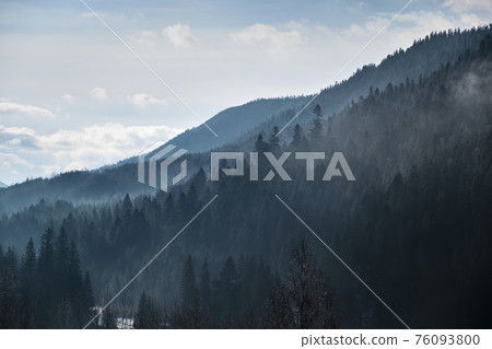 Sunrise in a Valley at Foggy Morning Mountains Landscape 76093800