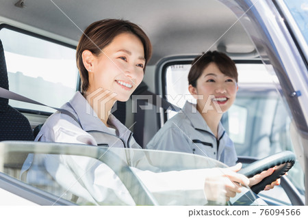 Female driver home delivery image of a shipping company Female driver home delivery image of a shipping company 76094566