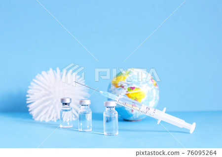 Conceptual photo for worldwide pandemic vaccination, beginning of mass vaccination for coronavirus COVID-19, influenza or flu, world immunization. Selective focus 76095264