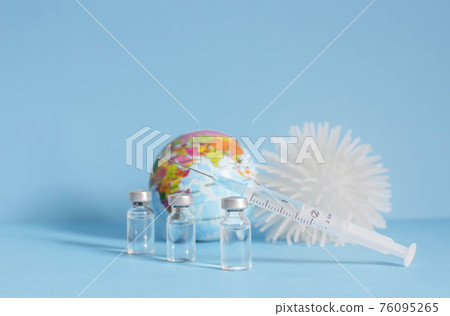 Conceptual photo for worldwide pandemic vaccination, beginning of mass vaccination for coronavirus COVID-19, influenza or flu, world immunization. Selective focus 76095265