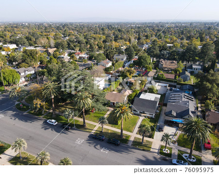 Aerial view above Pasadena neighborhood in California 76095975