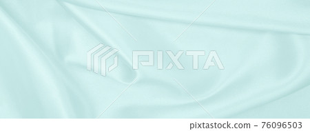 Smooth elegant blue silk or satin luxury cloth texture as abstract background. Luxurious background design Smooth elegant blue silk or satin luxury cloth texture as abstract background. Luxurious background design 76096503