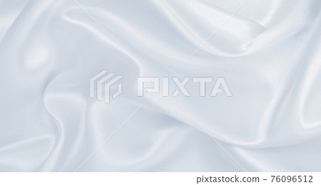 Smooth elegant grey silk or satin luxury cloth as wedding background. Luxurious Christmas background or New Year background design Smooth elegant grey silk or satin luxury cloth as wedding background. Luxurious Christmas background or New Year background design 76096512