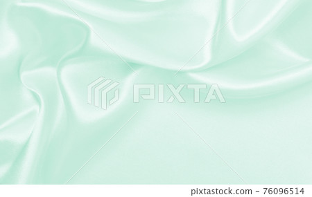 Smooth elegant green silk or satin luxury cloth texture as abstract background. Luxurious background design Smooth elegant green silk or satin luxury cloth texture as abstract background. Luxurious background design 76096514