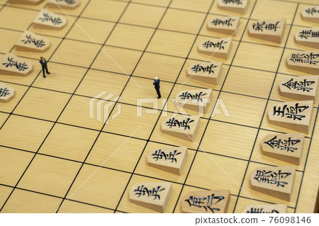 Shogi pieces and miniature businessmen Shogi pieces and miniature businessmen 76098146