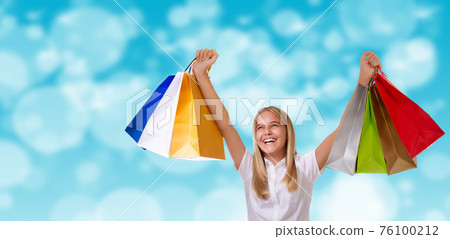 shopping,holiday and tourism concept - happy cheerful girl with shopping bags shopping,holiday and tourism concept - happy cheerful girl with shopping bags 76100212