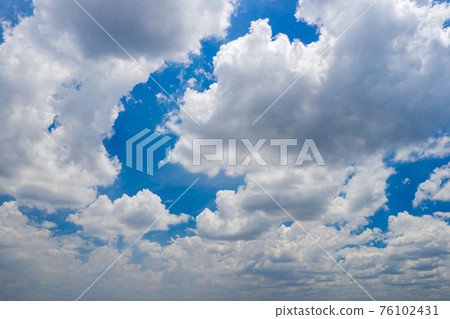 Large amount of white clouds on blue sky background Large amount of white clouds on blue sky background 76102431