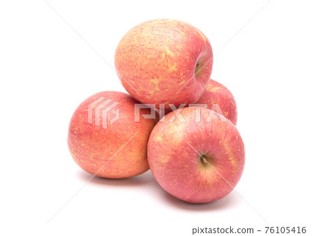 Fuji apples isolated on white background. Healthy food concept Fuji apples isolated on white background. Healthy food concept 76105416