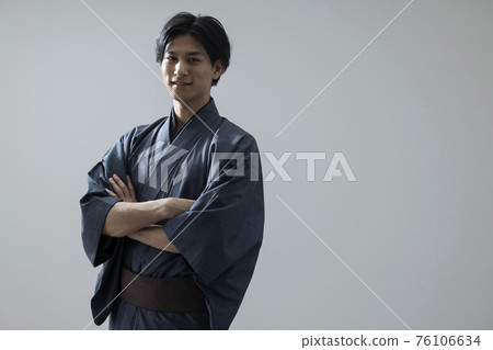 Young man in kimono Young man in kimono 76106634