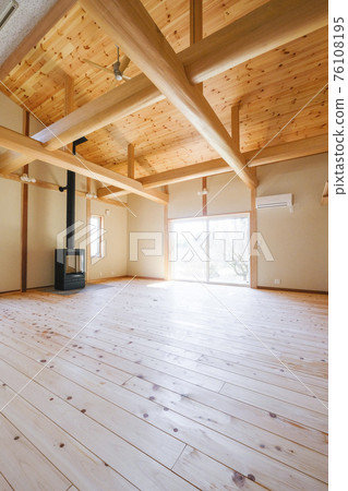 Wooden house living room and wood stove 76108195