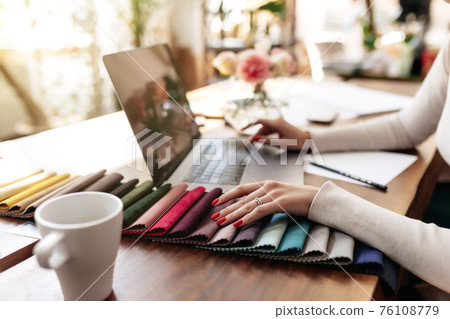 An interior designer is working on a new project An interior designer is working on a new project 76108779