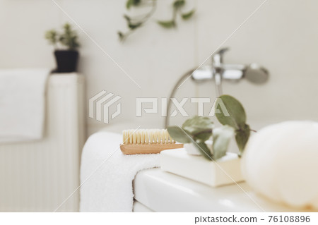 Washbasin in bathroom, bath accessories. Household, hotel cleaning concept Washbasin in bathroom, bath accessories. Household, hotel cleaning concept 76108896