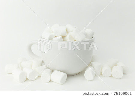 Marshmallow in the cup on the white background 76109061