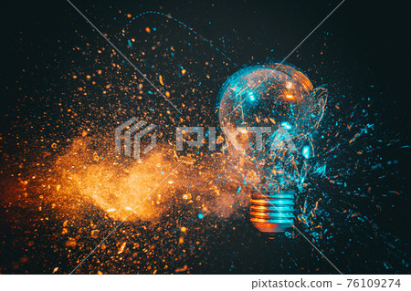 explosion of a filament light bulb. 76109274