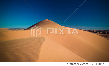 Sunset view to Tin Merzouga dune at Tassili nAjjer national park in Algeria Sunset view to Tin Merzouga dune at Tassili nAjjer national park in Algeria 76110548