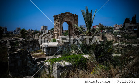 Remains of necropolis in ancient columns excavation site in Tyre at Lebanon 76110553