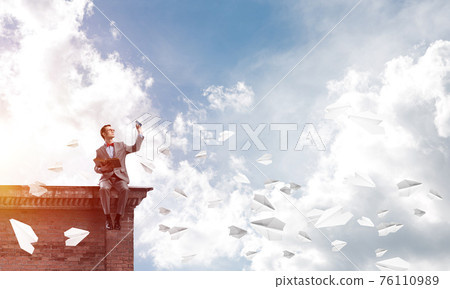 Young businessman or student studying the science and holding smartphone in hand Young businessman or student studying the science and holding smartphone in hand 76110989
