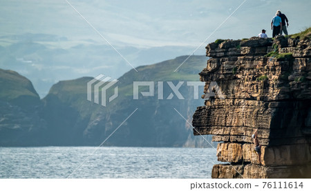 Muckross Head, Donegal - Ireland, popular for horizontally layered sandstone and thin layers of Muckross Head, Donegal - Ireland, popular for horizontally layered sandstone and thin layers of 76111614